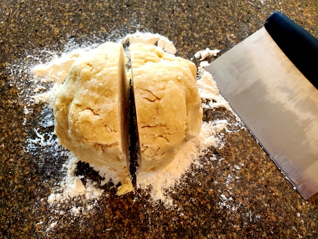 Pie dough cut in half