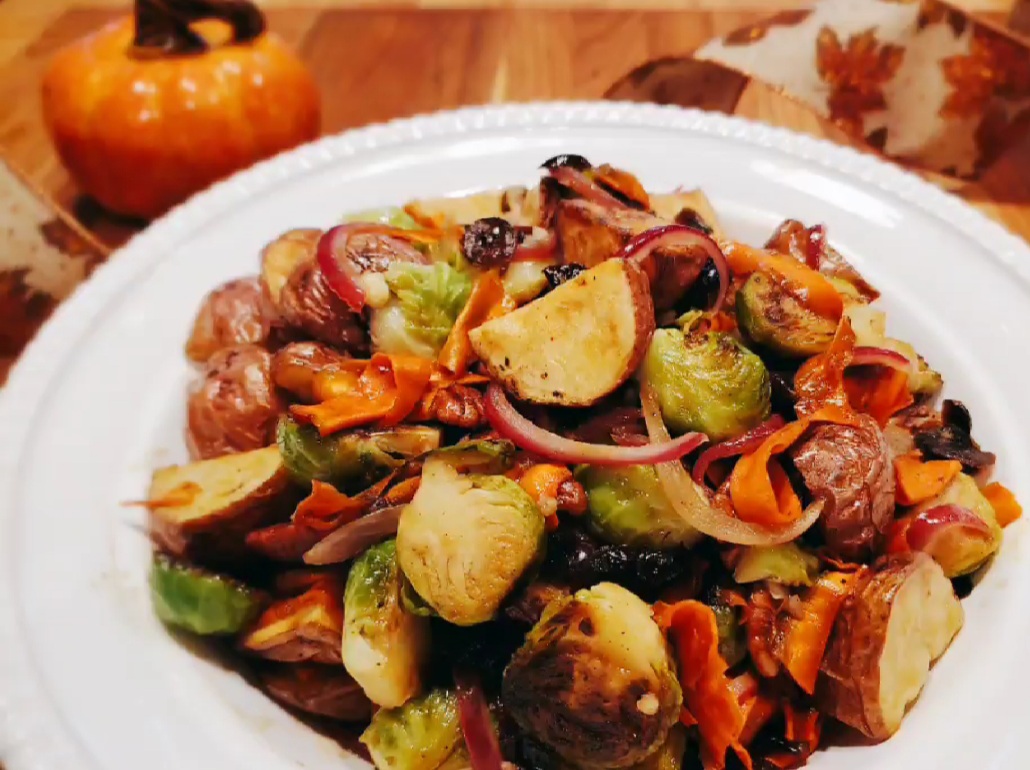 plate of roasted potatoes and brussle sprouts salad